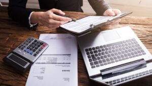40 million Americans claim the child tax credit but two simple mistakes can cost you the $1,700 refundable portion 21 Tax credit, man working on tax