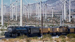 Built to haul 3,600 tons over the Wasatch Range, the world's largest steam locomotive hides a trick inside its 133 foot frame that lets it bend through a mountain curve 18 a giant steam locomotive bending through a mountain curve