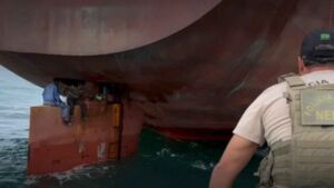 They climbed onto a ship’s rudder in Lagos after midnight and waited 15 hours for the engines to start, and 14 days later a police boat pulled up alongside them off the coast of Brazil 7 2 men roped to a net above a ship's rudder