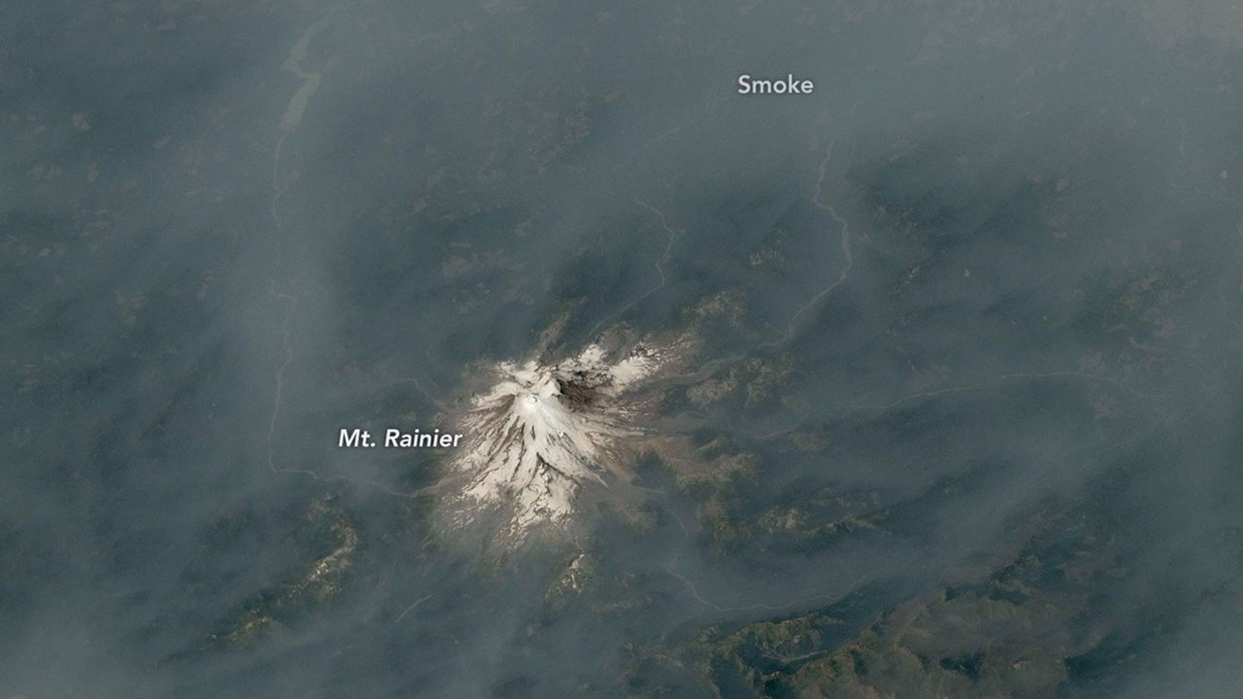 Astronauts looked down at the Pacific Northwest and saw its most iconic mountains 22drowning22 in a sea of wildfire smoke