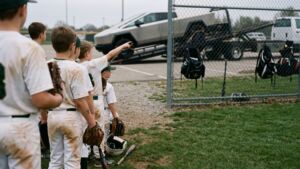 At an Ohio baseball field 28 kids watched a stainless pickup cap itself at 15 miles an hour and leave on a flatbed, and the culprit was a front trunk latch that lifted 1 inch and never seated 5 Children watching a pickup with its front trunk ajar being towed
