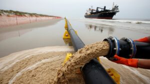 Sand pumped off the seafloor by a 15,150 cubic yard hopper dredge is rebuilding Gulf beaches, and its temperature decides whether the turtle nests laid in it come out male or female 22 largest dredge pumping sand onto a Gulf Coast beach for sea turtle nesting restoration