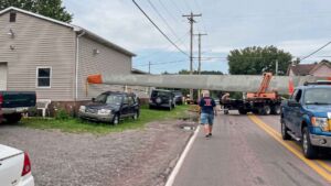 A turbine blade jammed at a right angle corner in Bradenville and drove 1 foot through the wall of a repair shop, and the permit that routed it there described the cargo as a paper machine roll 45 A turbine blade tip pushed through a repair shop wall