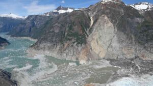 About 84 million cubic yards of rock came off an Alaska fjord wall and drove a landslide tsunami almost a third of a mile up the opposite slope, but the only things lost were a kayak and a camp 36 Tracy Arm tsunami landslide scar and stripped fjord wall in Alaska, after 64 million
