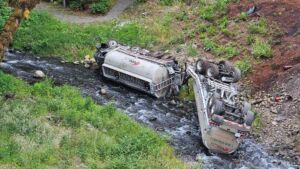 Crews boomed a coastal Washington creek in 4 places after a tanker left the highway above it and put gasoline in the water, while the returning salmon were sent straight up that creek anyway 44 containment boom stretched across Indian Creek after the fuel spill near Port Angeles, fuel tanker left