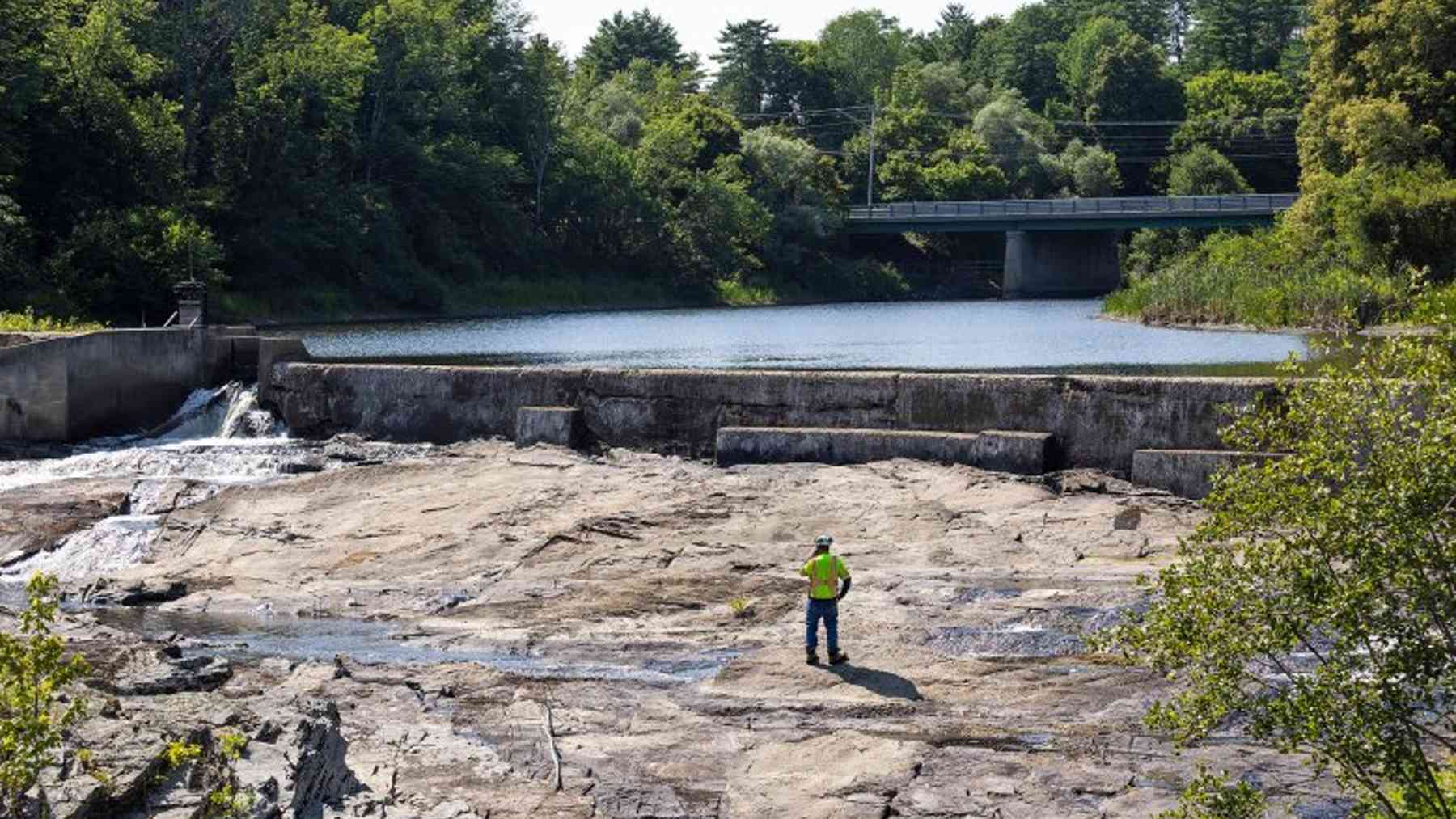 Workers are tearing out a 275 foot dam on Maine's Royal River, a removal expected to reopen about 135 miles of river and tributary habitat and bring spawning alewives back upstream 1 Excavator tearing down the Royal River dam during the Yarmouth removal project, 275 foot dam
