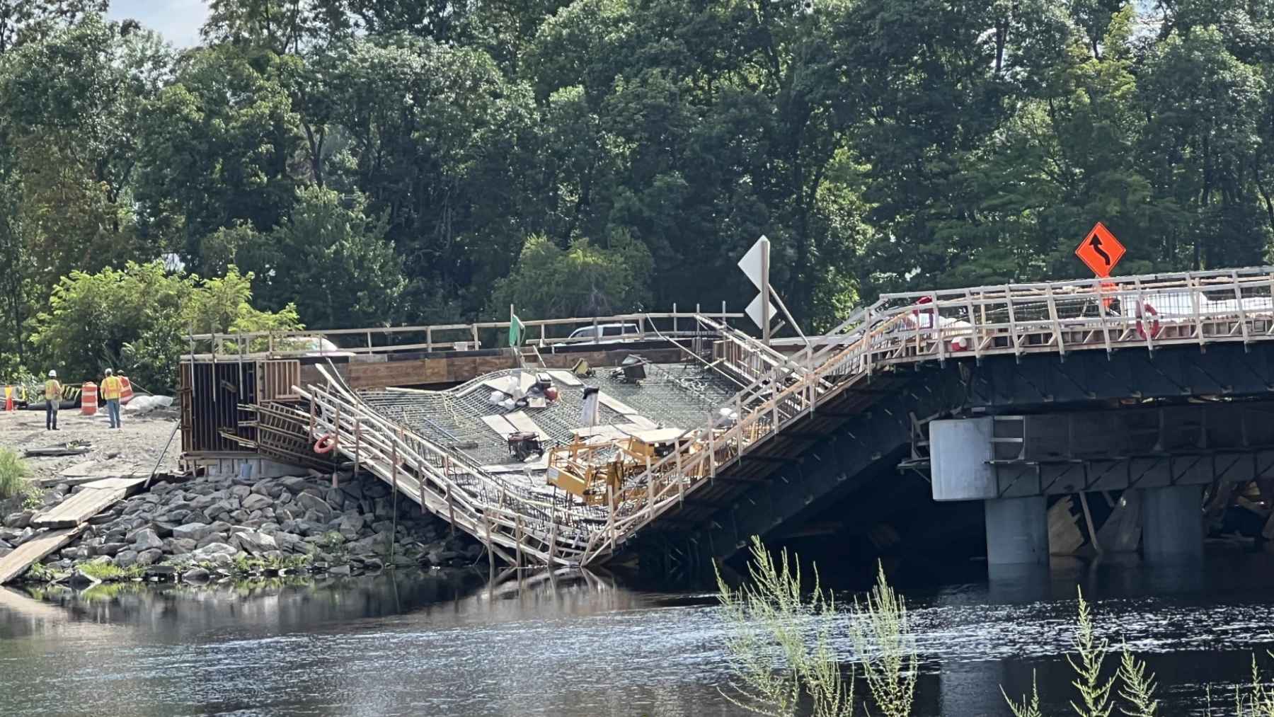 A 150 foot span in Old Town Maine dropped into the Stillwater River while crews poured its concrete deck, and the state has decided to pull out the composite girders it had already installed