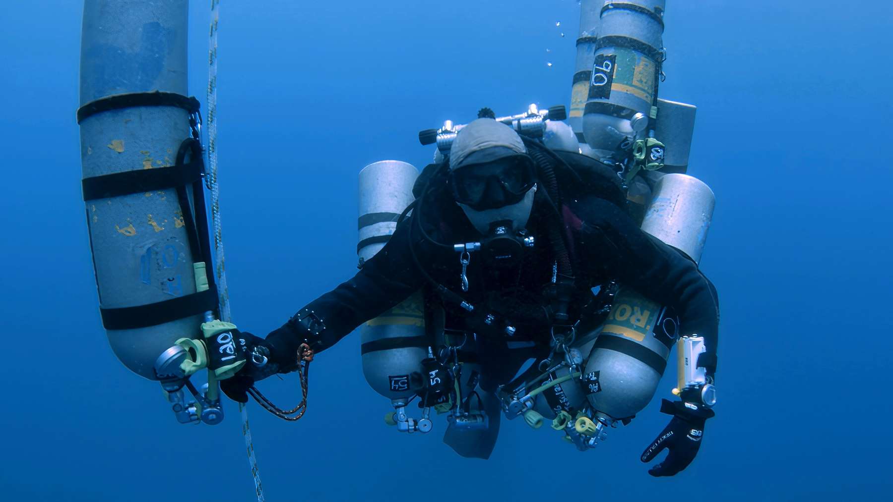 Technical diver on a decompression line after a diver descended Red Sea dive, diver touched 1