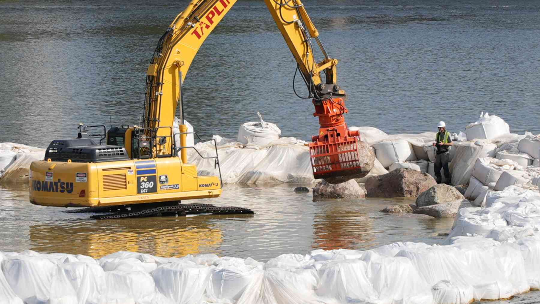 Crews began pulling four low-head dams out of the Grand River in downtown Grand Rapids this summer, and 30 acres of river corridor are being rebuilt with boulders for spawning lake sturgeon