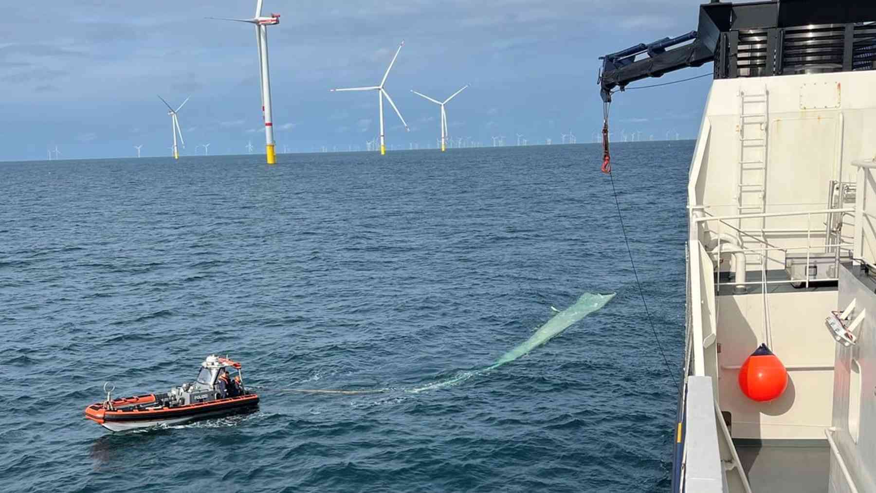 Police off the German North Sea coast sawed a 66 foot piece of a broken wind turbine blade into sections before they could drag it aboard a patrol ship