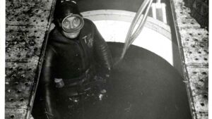 A steel habitat held one diver 205 feet down off La Jolla for 30 days, and his voice carried the first telephone call ever made from the ocean floor to a crew in orbit 10 Diver inside the steel habitat 205 feet underwater keying a microphone handset, steel habitat held
