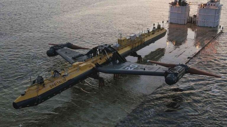 Floating tidal turbine off Orkney lifting its rotor arm clear of the sea for maintenance, two 100 ton