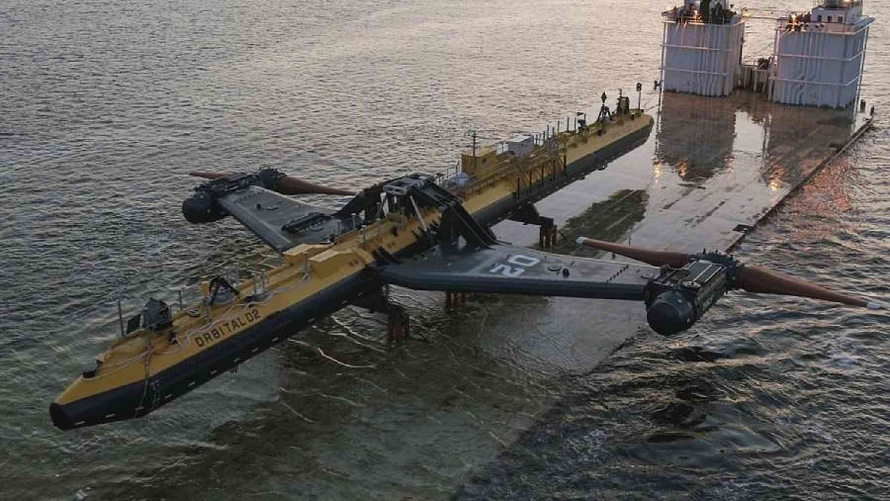Two 100 ton rotors fold upward on a floating turbine moored off Orkney, so a small workboat can reach them without a heavy lift ship