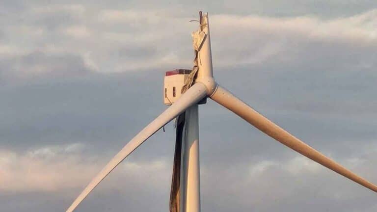 Broken wind turbine blade root above the sea